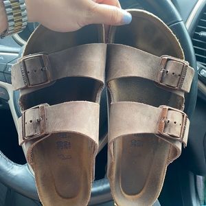 brown leather Birkenstock’s